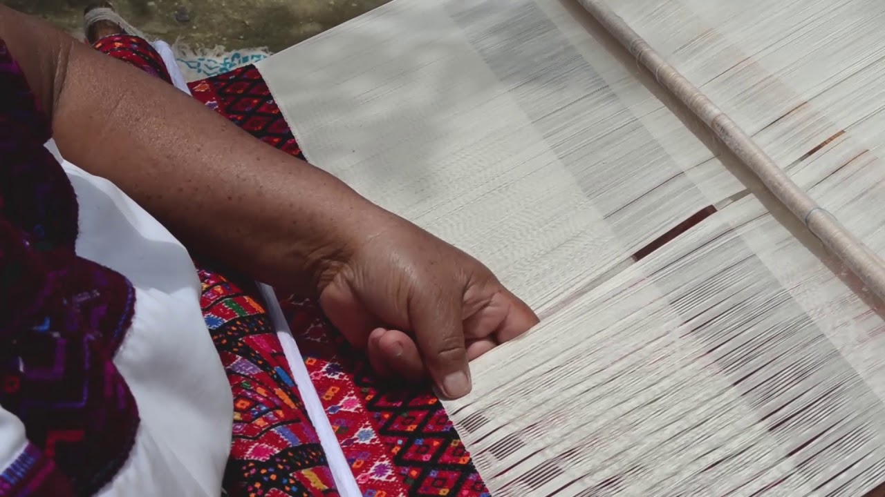 Empowering Threads: Magdalena López López weaving on a backstrap loom, Bayalemó, Mexico