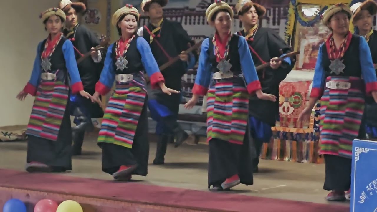 homes student performing tibetan dance.