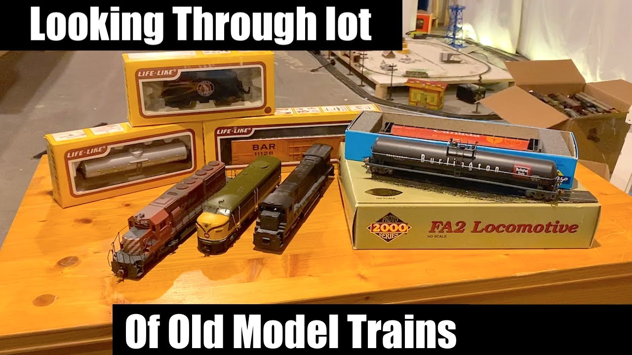 Looking Through Lot Of Old Model Trains