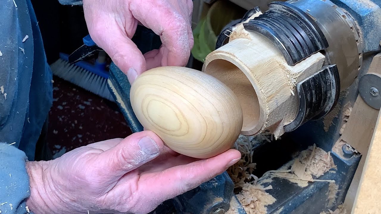 Richard Raffan turns a wooden egg.