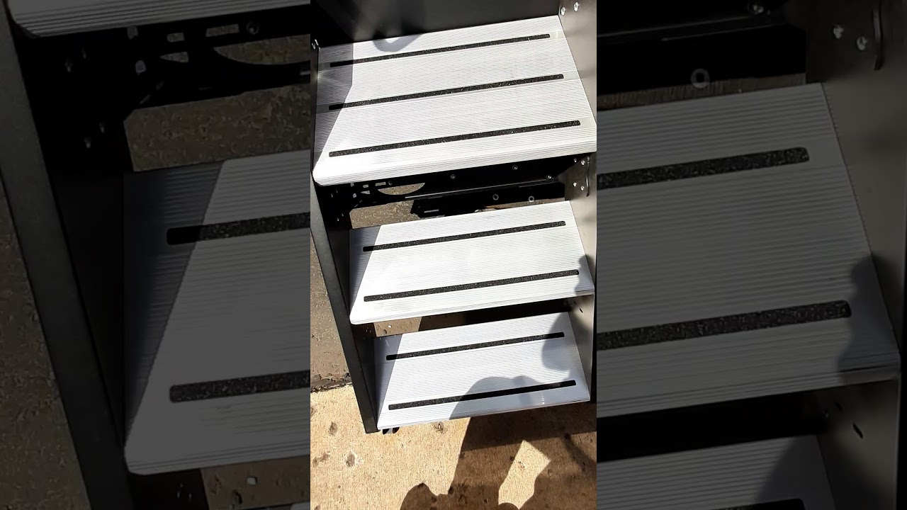 Installed a Lippert Solid step with a door gas strut.
