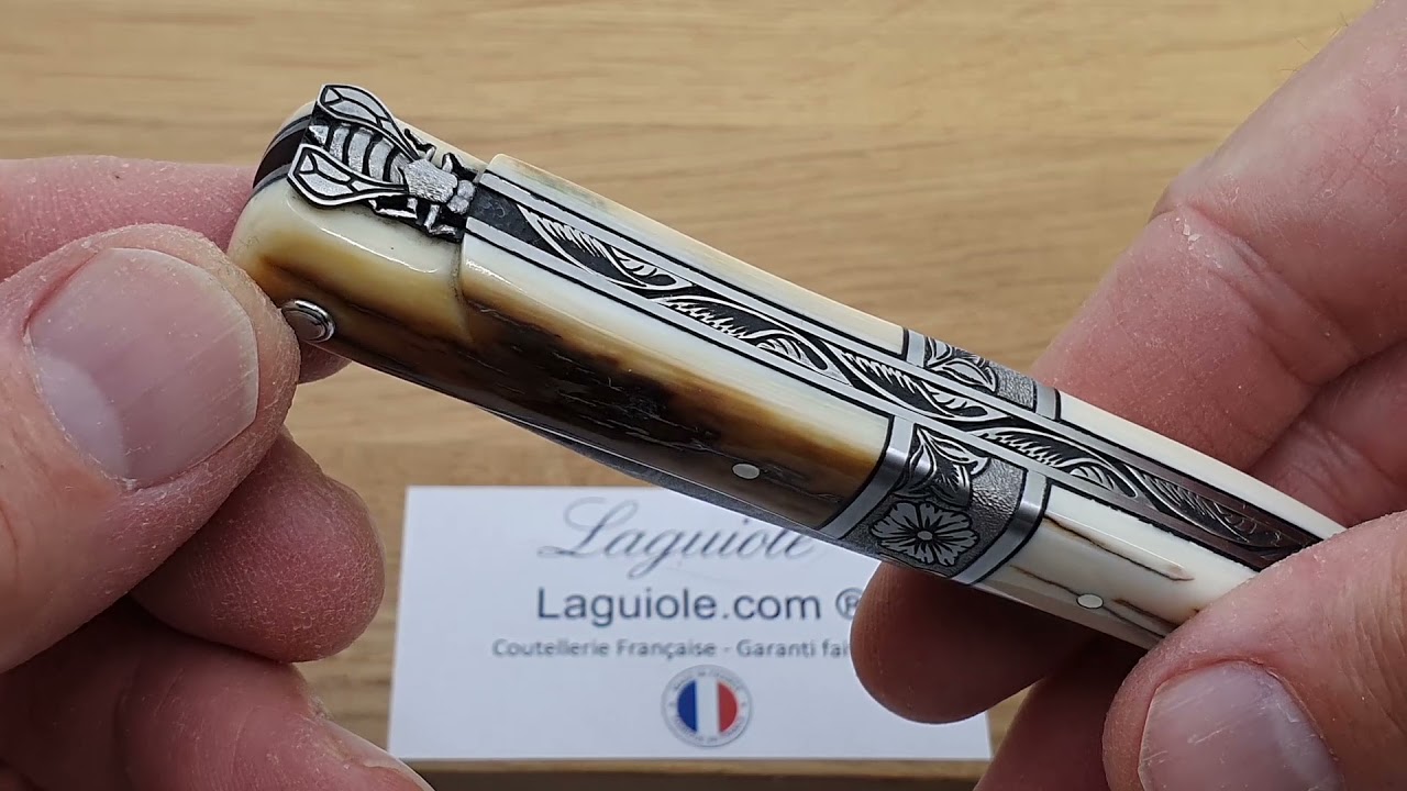 Couteau Prestige Laguiole en Aubrac 12 cm mitre centrale manche défense de Mammouth Abeille inverse