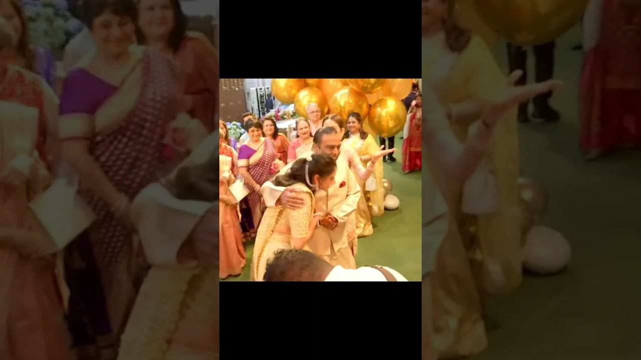 mukesh ambani holding hand radhika