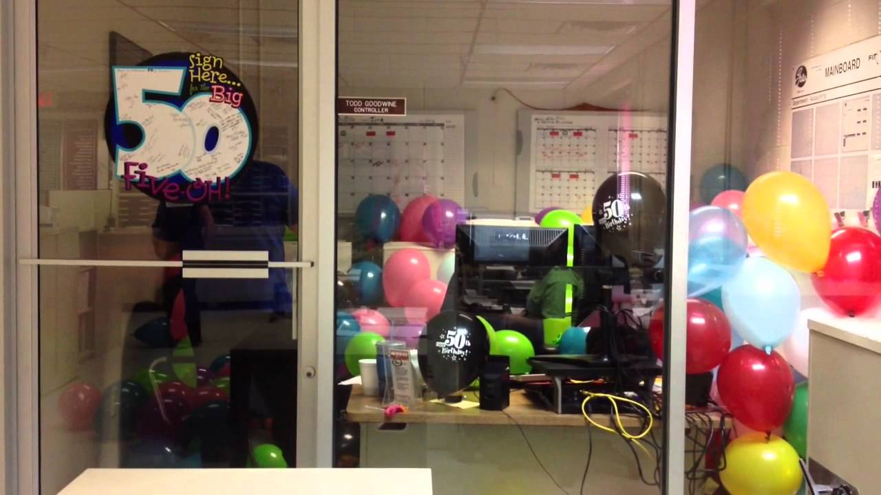 A Man, A Private Office, And A Stash Of Inflatable Latex