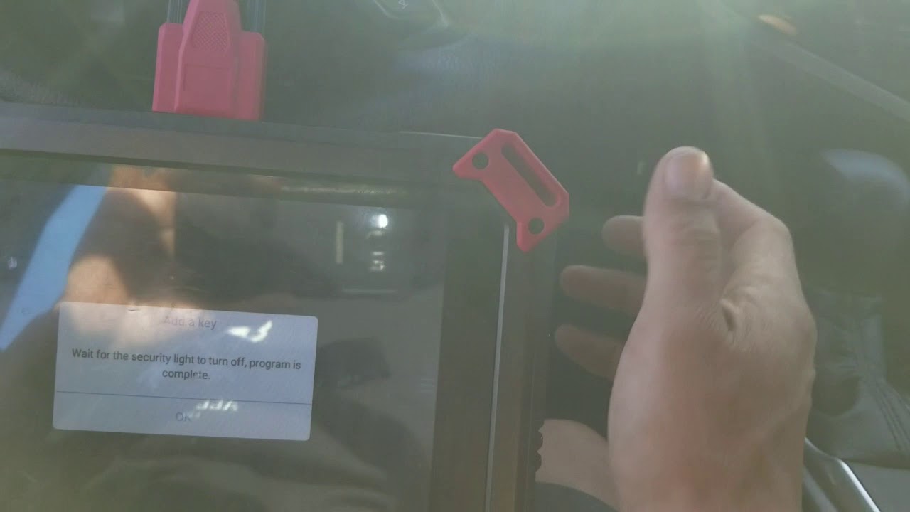 X-tool auto pro pad, is adding a new flip key to a 2018 Toyota Camry.