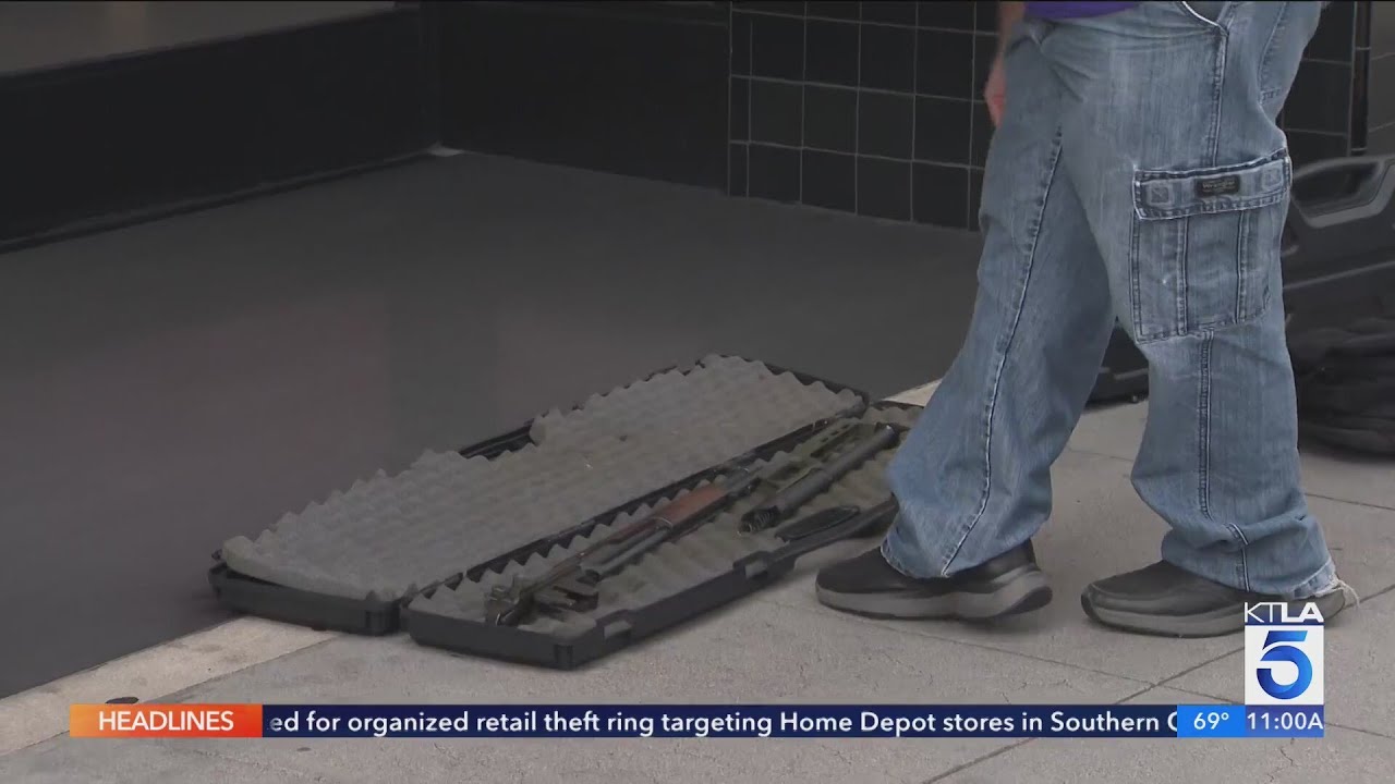 KTLA crew approached by man armed with guns