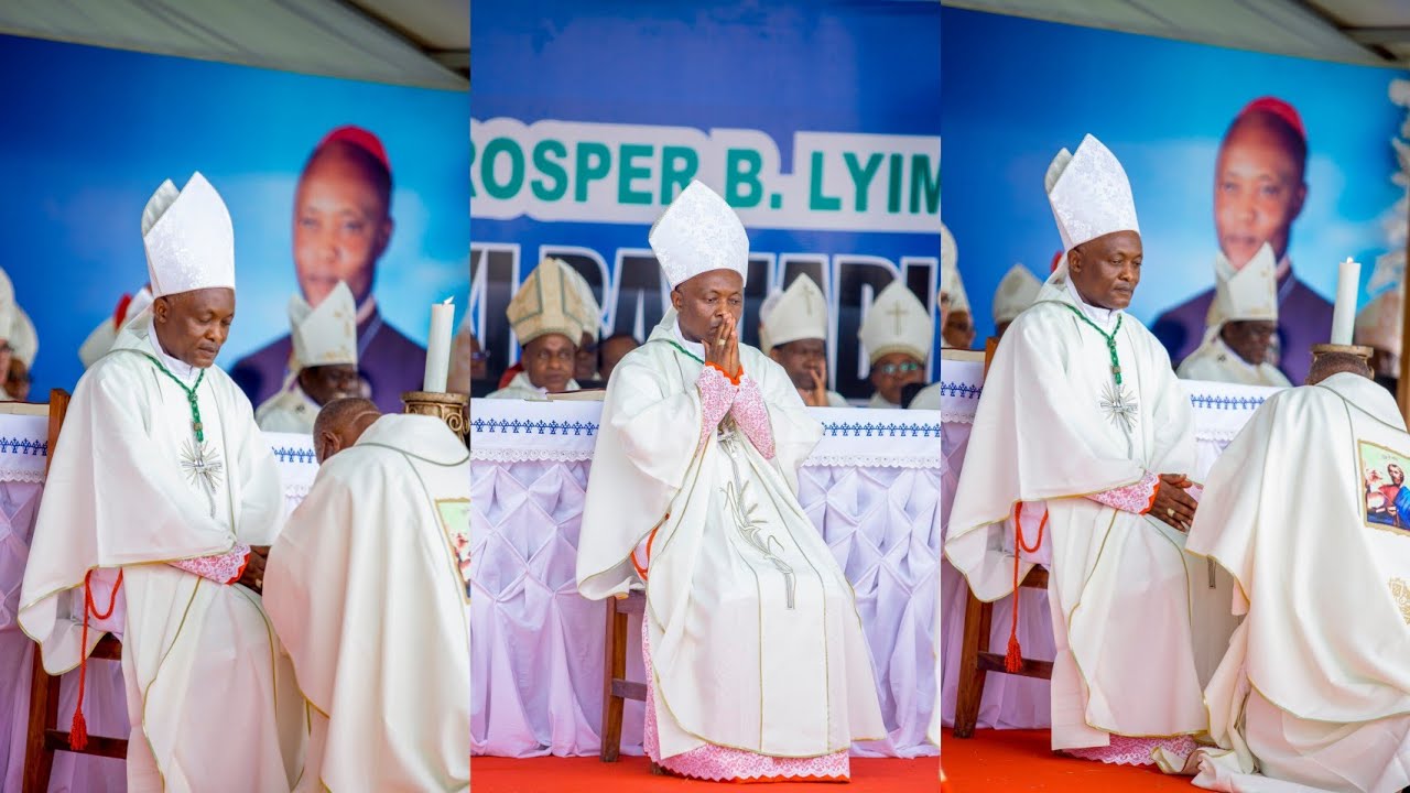 TAZAMA MAPADRE WA JIMBO JIPYA LA BARIADI WAKIBUSU MIKONO YA ASKOFU PROSPER LYIMO ISHARA YA  UTII