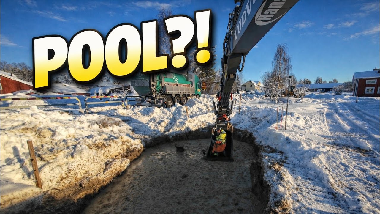 SNÖRÖJER MED GRÄVMASKIN