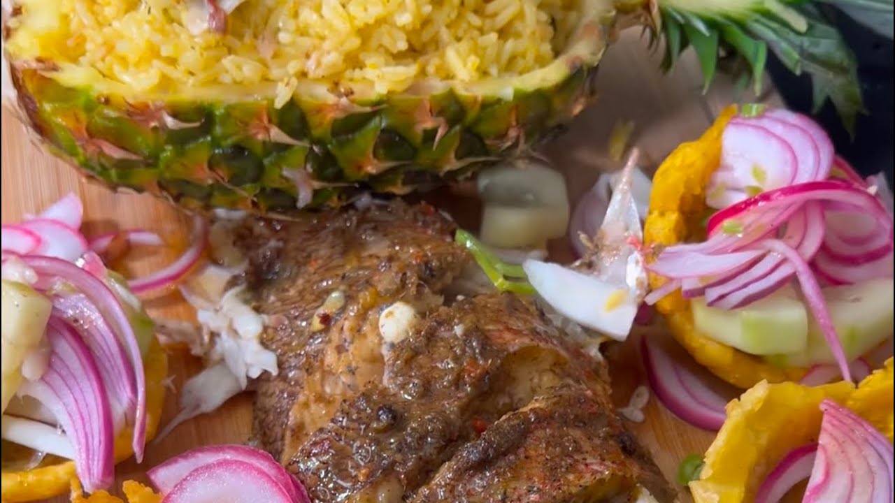 Whole roasted Snapper w/ Fried Green plantains and pineapple rice