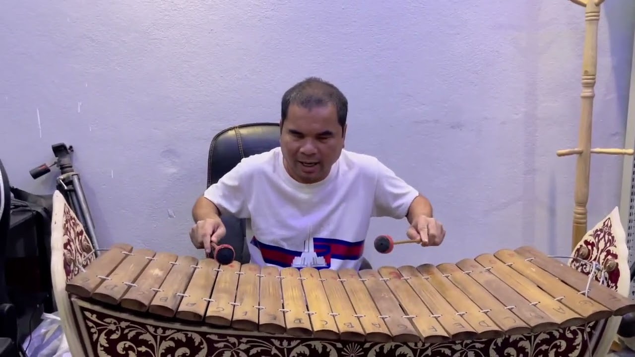 ឧបករណ៍រនាថឯកបង្ហាញលើអក្សរភ្លេងក្នុងបទអារ៉ាប់ជូនពរមួយជាន់។