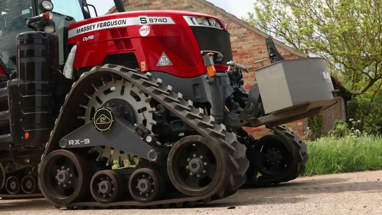 Massey Ferguson 8740 on Poluzzi's RX9-2430 tracks conversion.