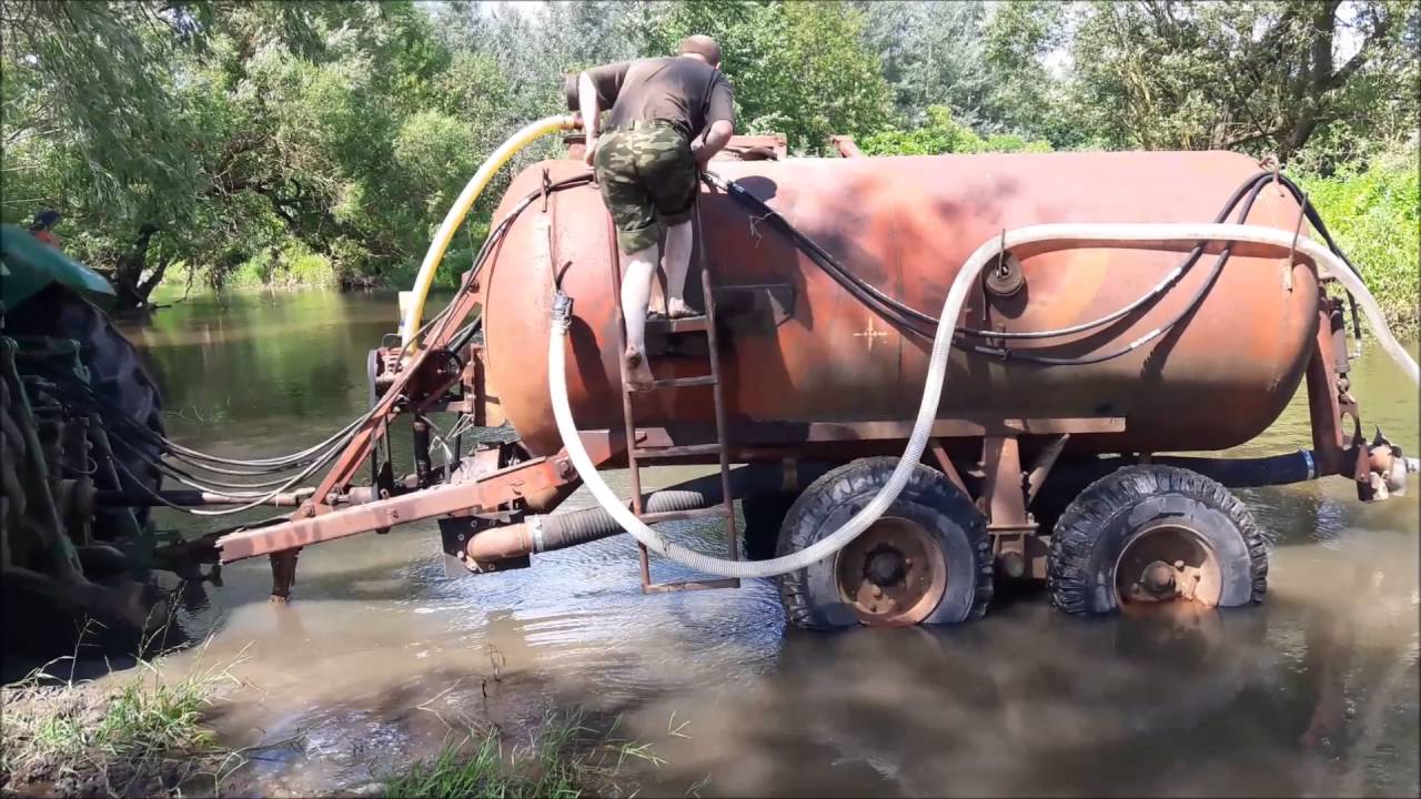 Битва за урожай 2016, испытание бочки  МЖТ-6 трактром John Deere 8200 на реке красная (раминте)