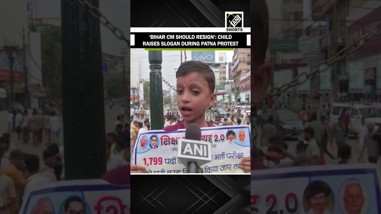 A young child participates in Patna protest raised a slogan calling for Bihar CM&rsquo;s resignation