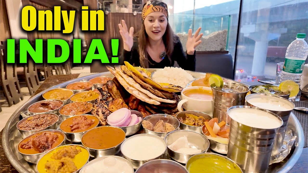 INDIA'S BIGGEST THALI totalling 50 DISHES!! | Here's my REACTION!