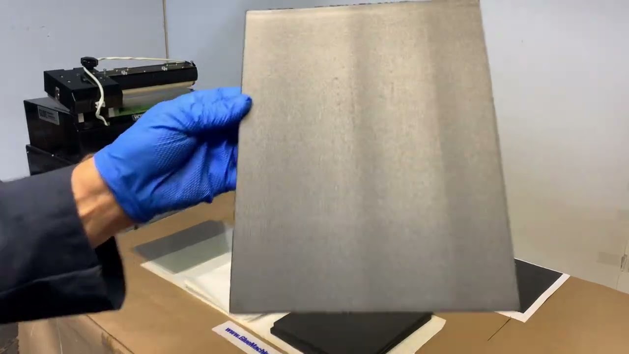 Coating foam with pressure sensitive hot melt using hot melt rollcoater