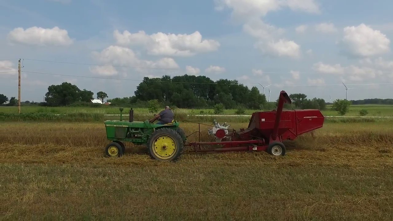 International 82 Combine Harvesting Oats