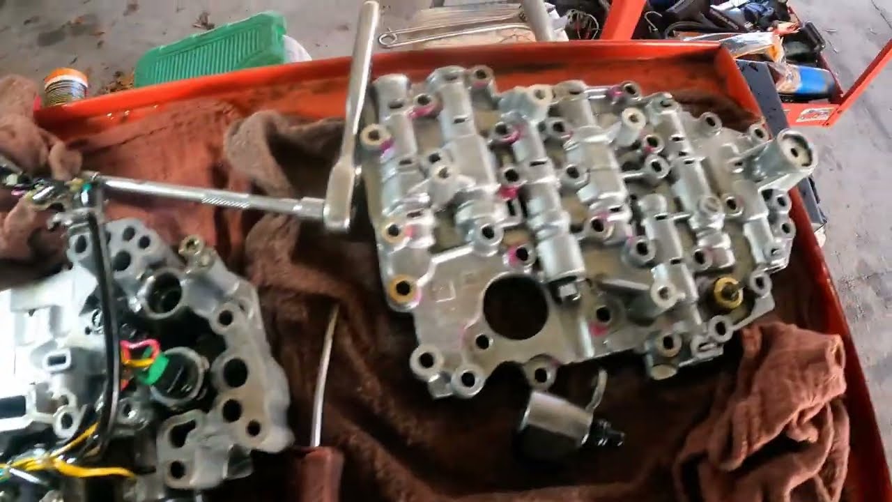 Как заменить соленоиды трансмиссии JF015E Chevy Spark/Nissan Sentra