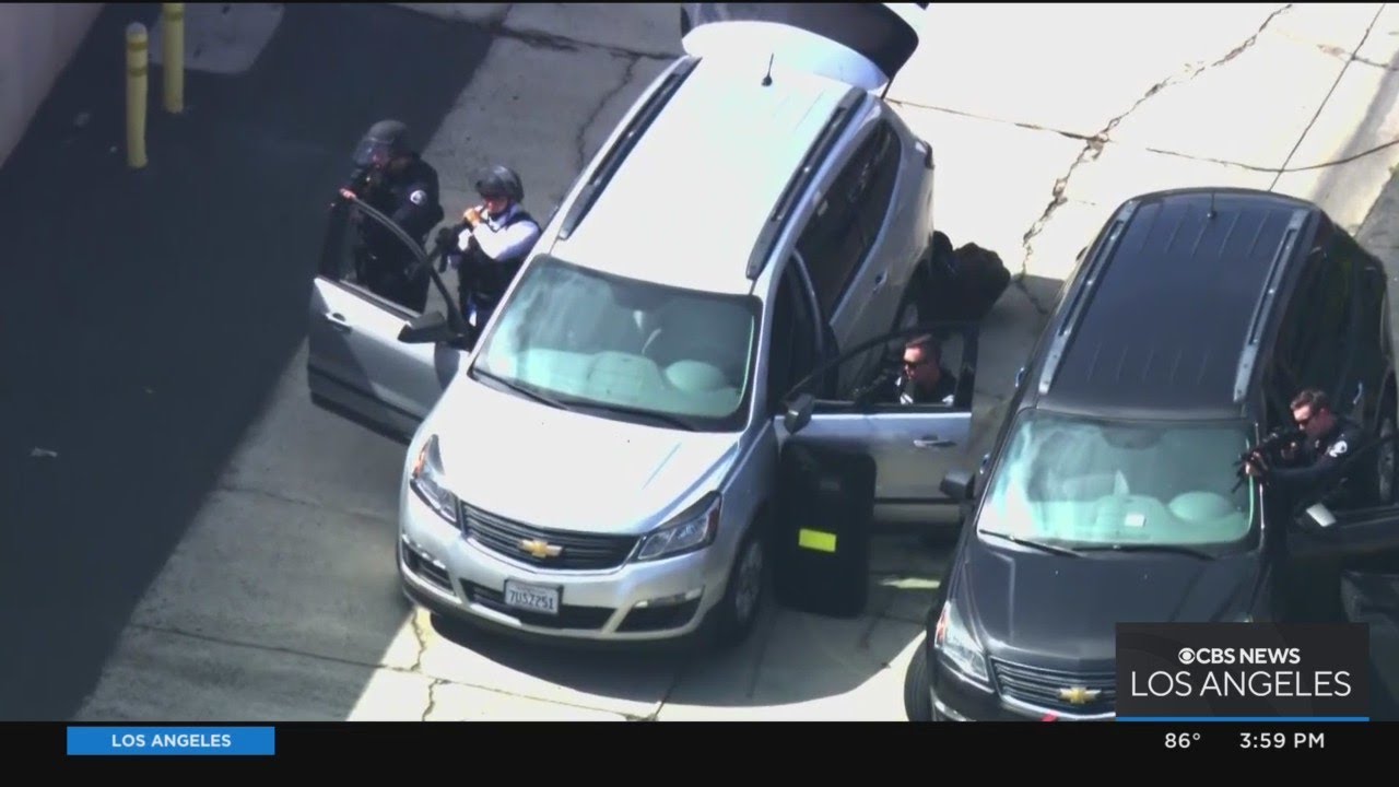 Armed suspect barricaded inside Costa Mesa warehouse; surrounded by law enforcement