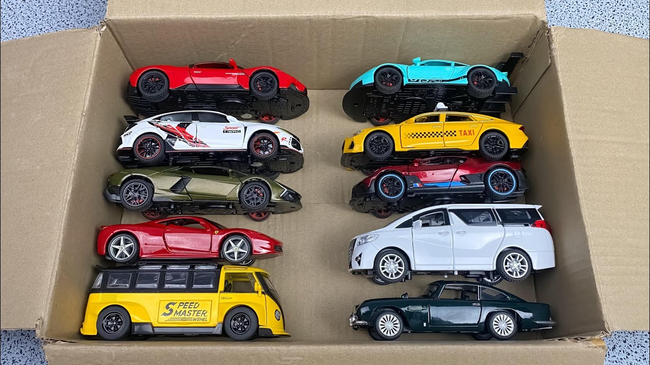 Box Full Of Model Car: Porsche, Nissan, Tesla, Maserati, Peugeot, Volvo, Renault, Subaru, Lexus