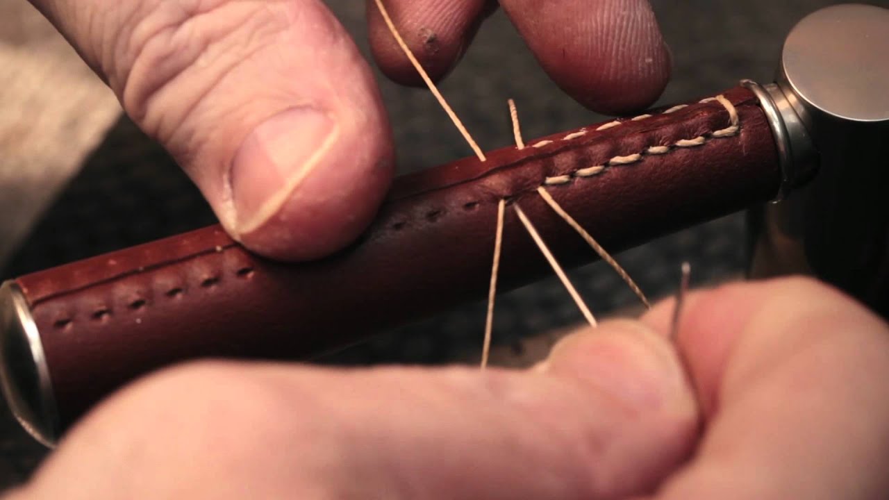 Turnstyle Designs hand made leather door lever in production.
