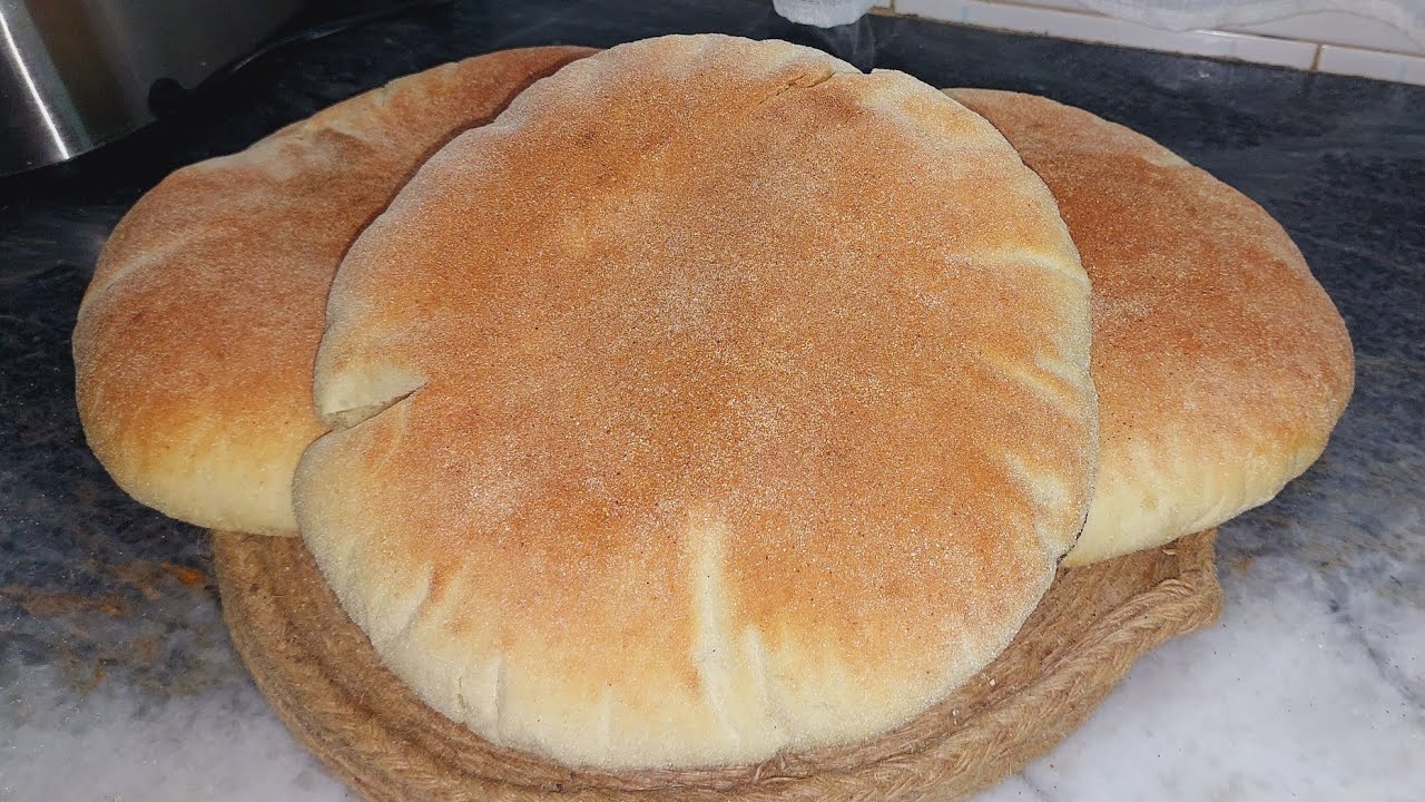 خبز المطلوع المنفوخ في الفرن بالسميد بدون دلك ولا تعب نتحدي اي وحدة ماتعرفش اديرو