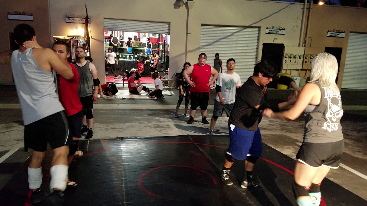 Beginners learning Latigos at Santino Bros. Wrestling
