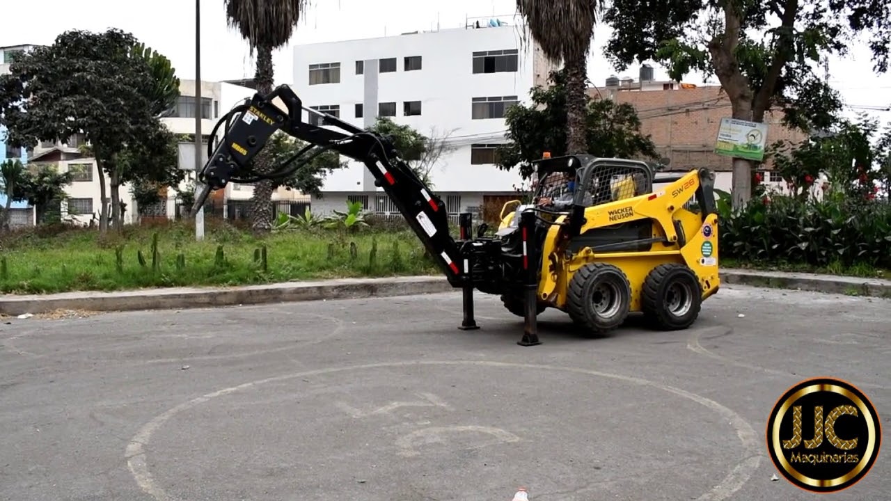 MiniCargador Wacker Neuson SW28 con Brazo Excavador y Martillo Hidráulico