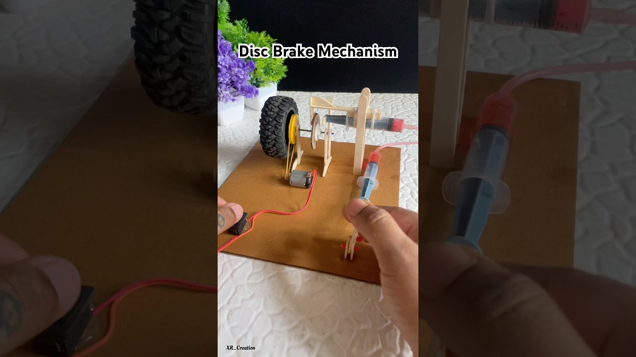 Car disc brake mechanism with Dc motor | #dcmotor #youtubeshorts #diy #motor #shorts #tech #car