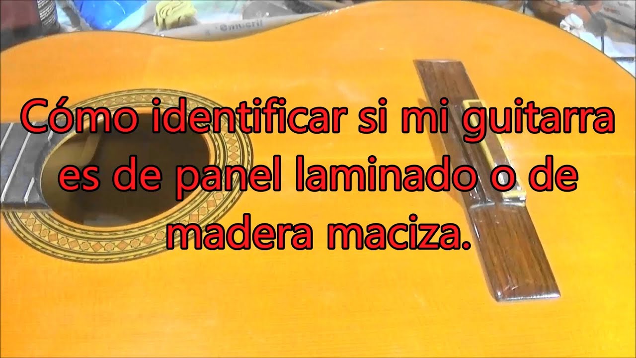 Cómo distinguir la madera maciza del panel laminado en una guitarra.