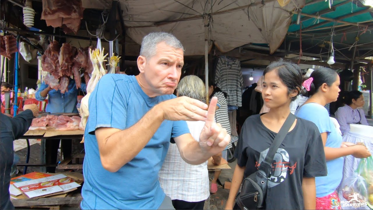 Cambodia: Deaf Food Vendor