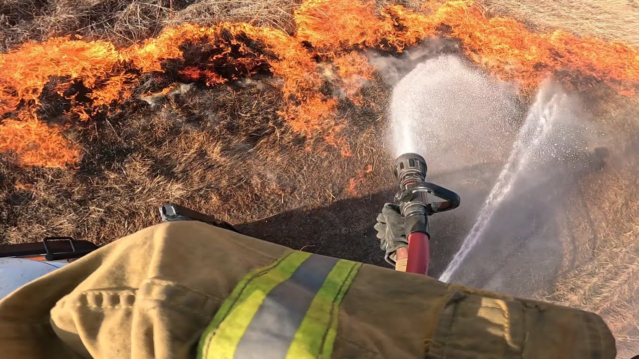 Grass fire back burn to contain some burning trees