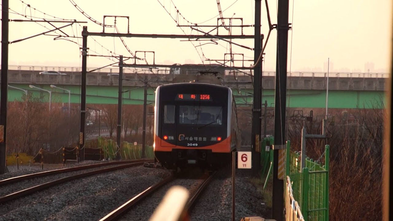 Korail & Seoul Metro Line 3 trains at Daegok