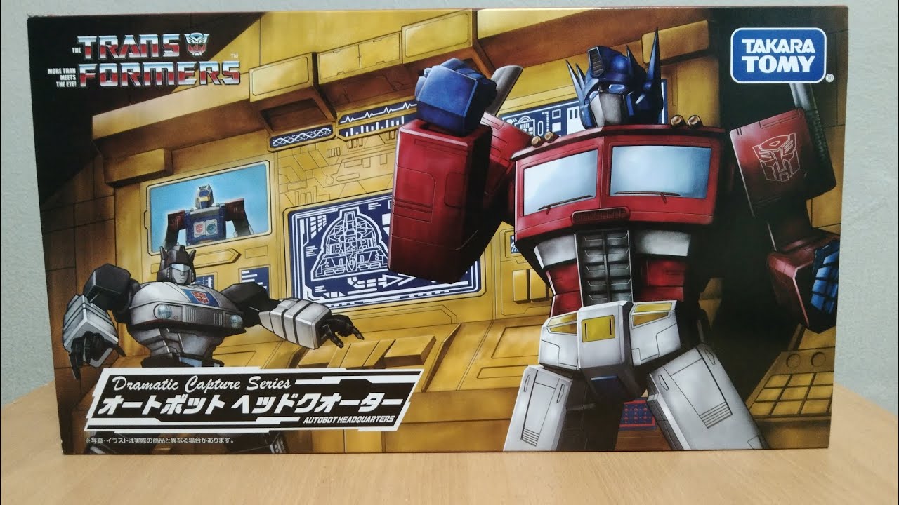 Transformers Dramatic Capture Series Autobot Headquarters package 