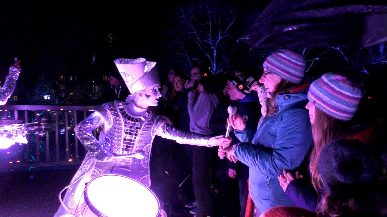 Spark! LED illuminated street theatre drummers at winter light nights festival in Perth, Scotland