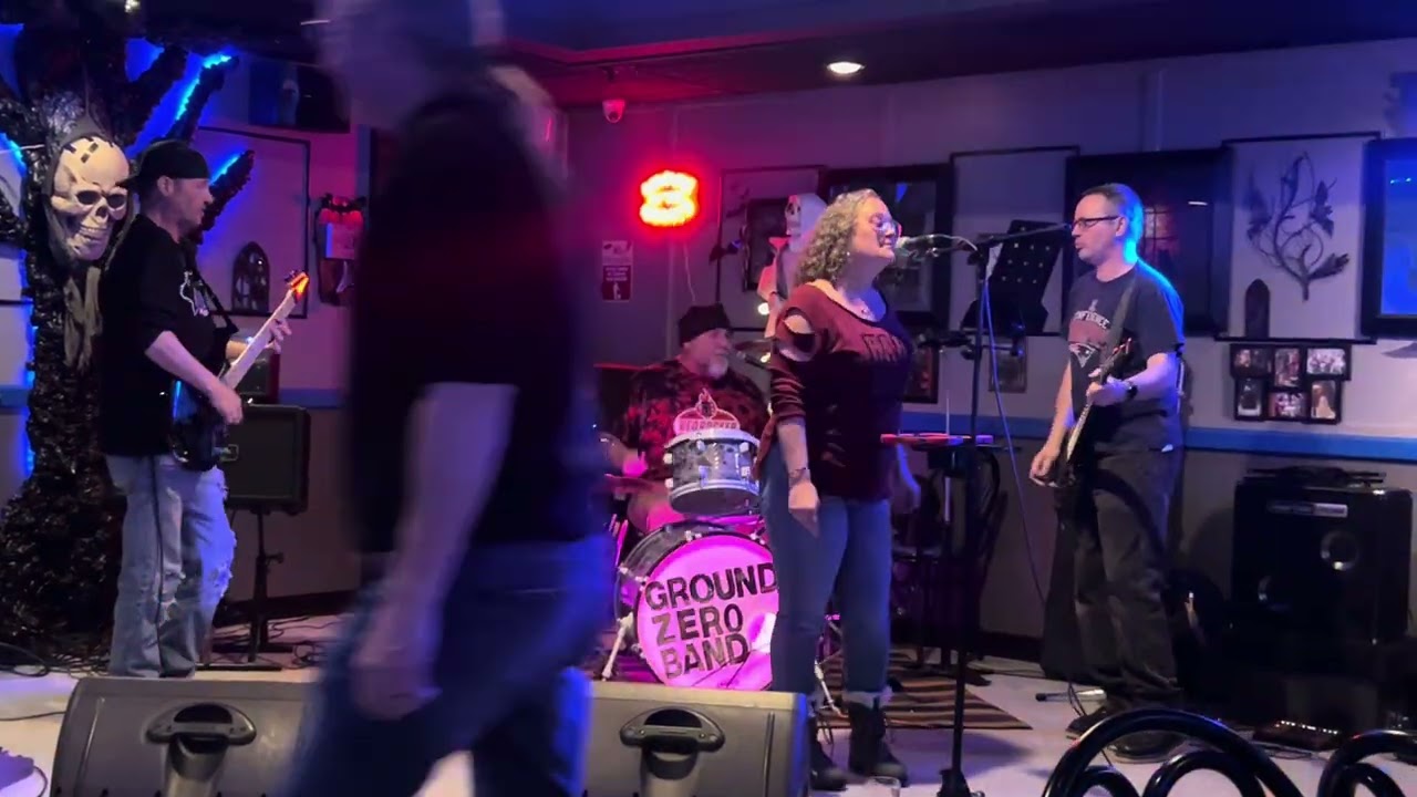 Debby singing Surrender with Zero Bar and grill Band