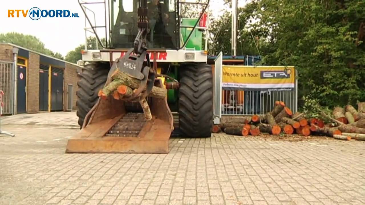 Houtkachel uitkomst sporthal en zwembad in Doezum