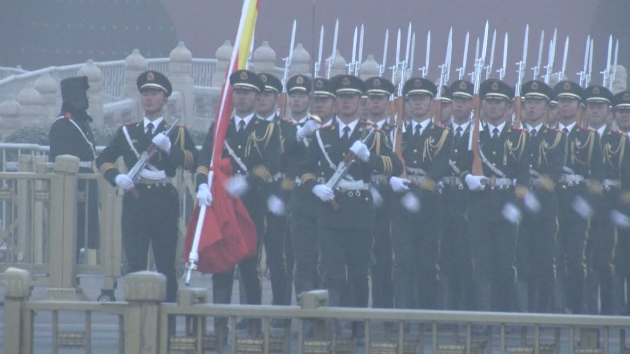 Thousands Watch National Flag Raising at Tian'anmen Square on New Year's Day