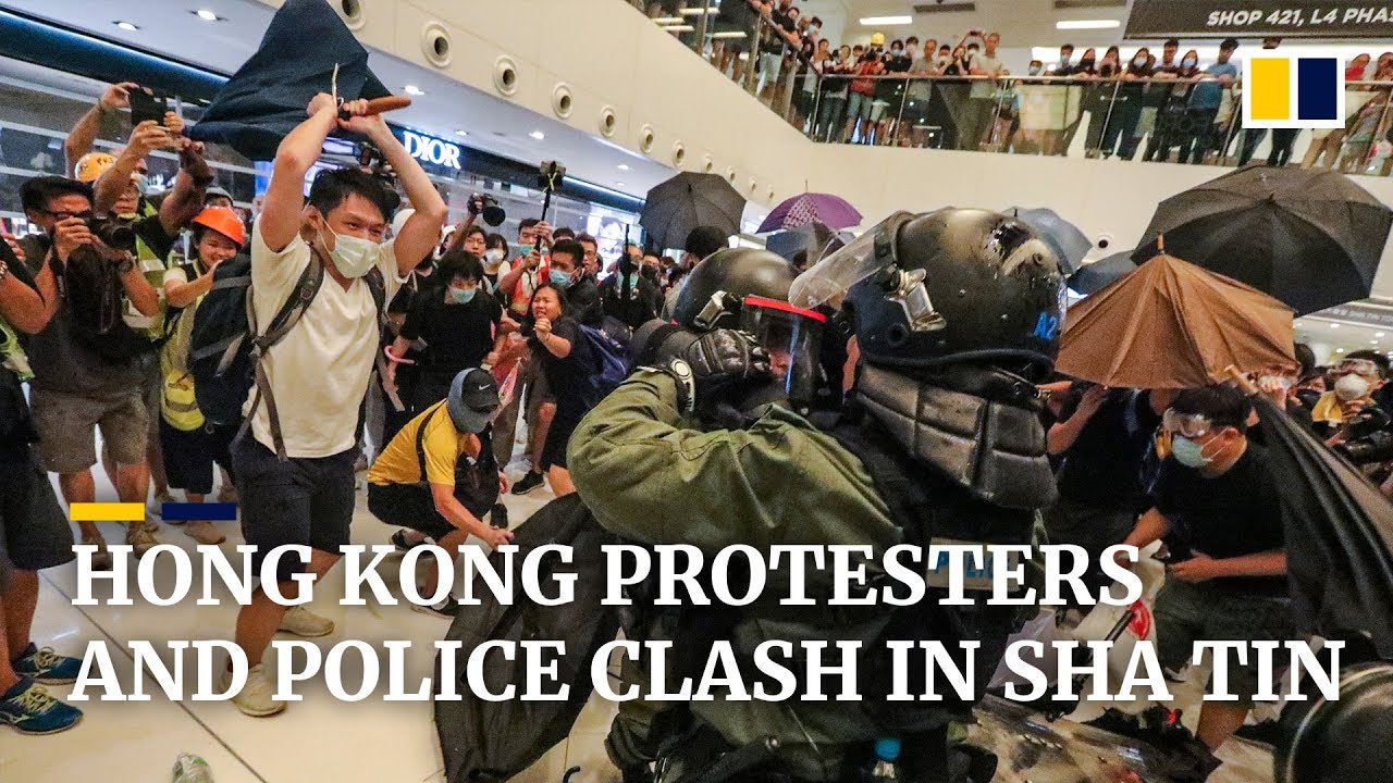 Hong Kong protesters and police clash in Sha Tin
