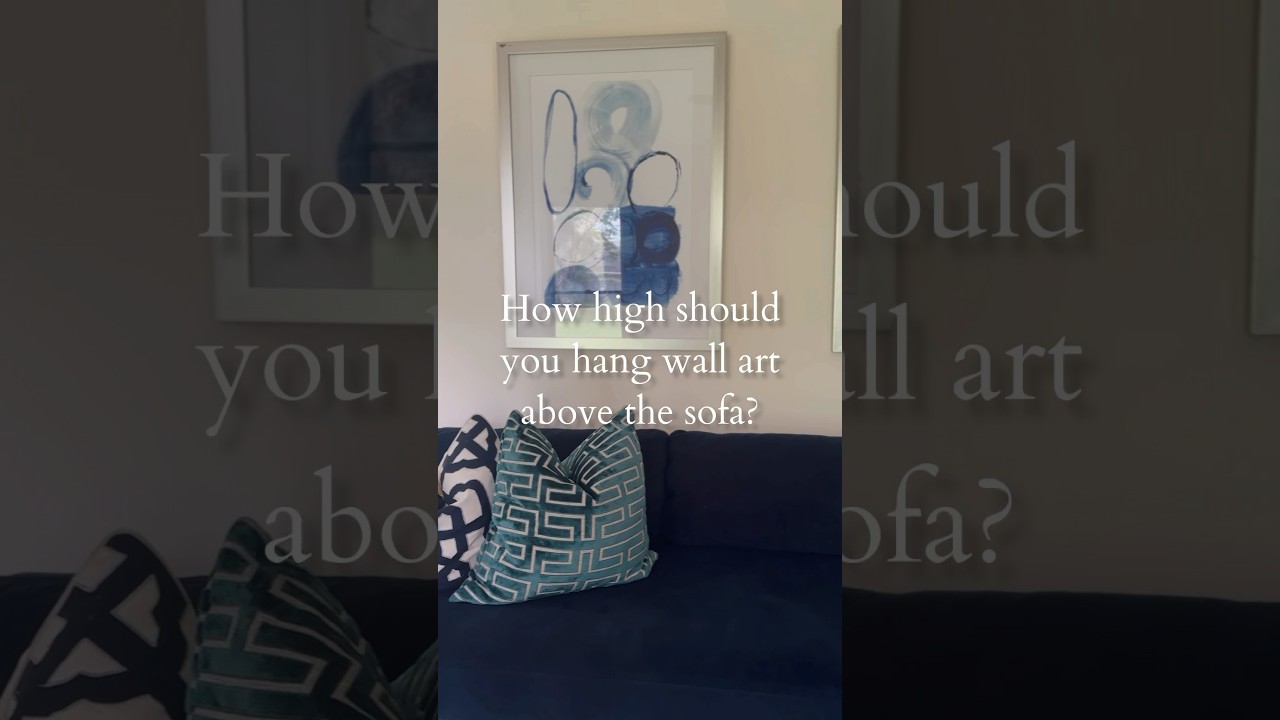 Here&rsquo;s how high you should hang wall Art above the sofa