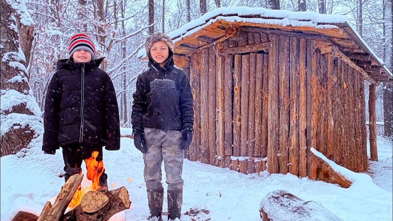 Winter Camping in Survival Shelter during Snowstorm #family #outdoors #adventure #survival