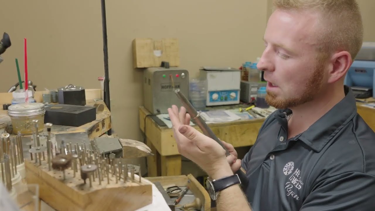 Replacing prongs on a diamond & re-setting the diamond.