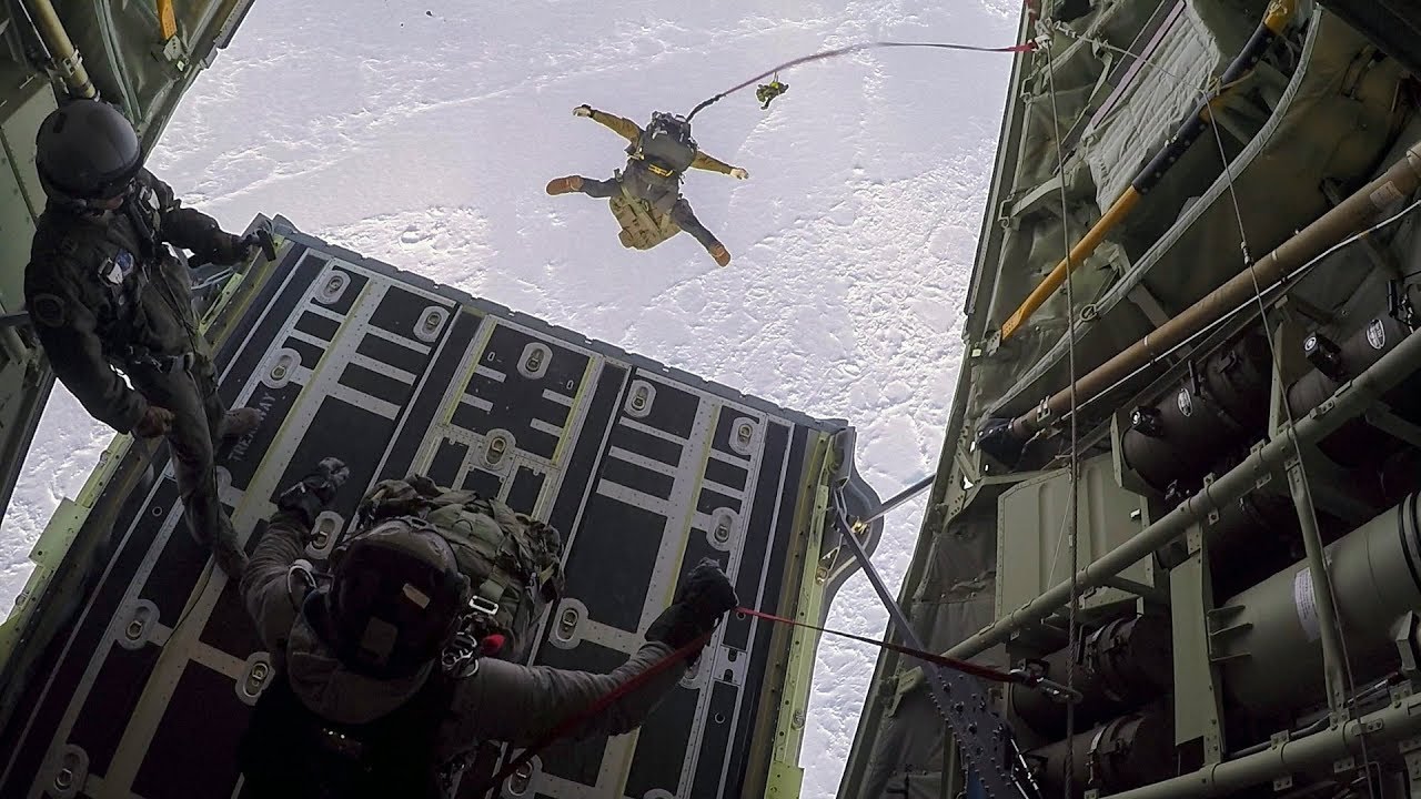 B Roll: Alaska National Guard HC 130J drops equipment, personnel to frozen Beaufort Sea