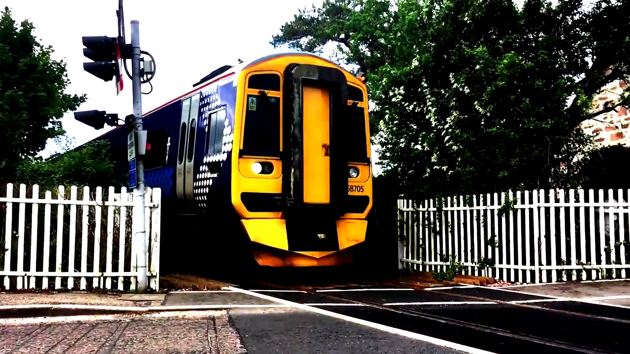 Trains at Dingwall Level crossing  no  1 24th May 2017
