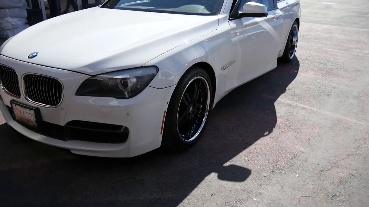 2011 BMW 750LI WITH 22 INCH STAGGERED BLACK & CHROME RIMS