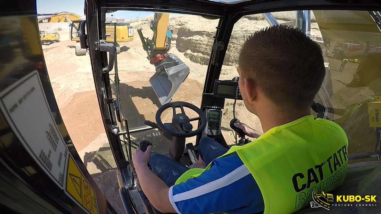 New CAT M315F wheel excavator with tiltrotator test drive - cab view