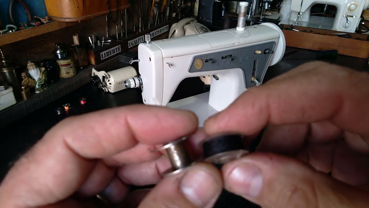 Como encher a bobina da máquina de costura Singer Ponto de Ouro, 660, Multiponto 666 e 667?