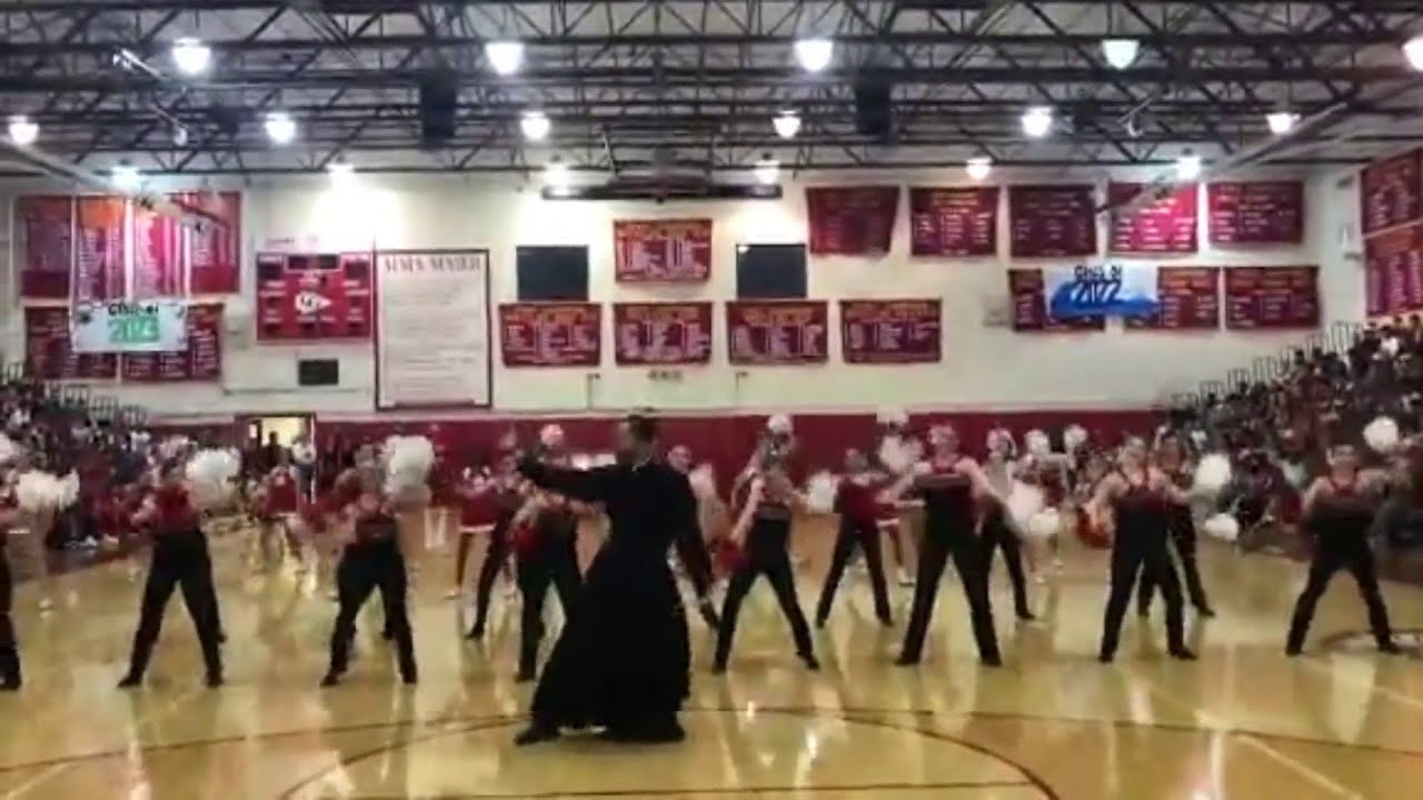 Priest shows off his dance moves at high school pep rally