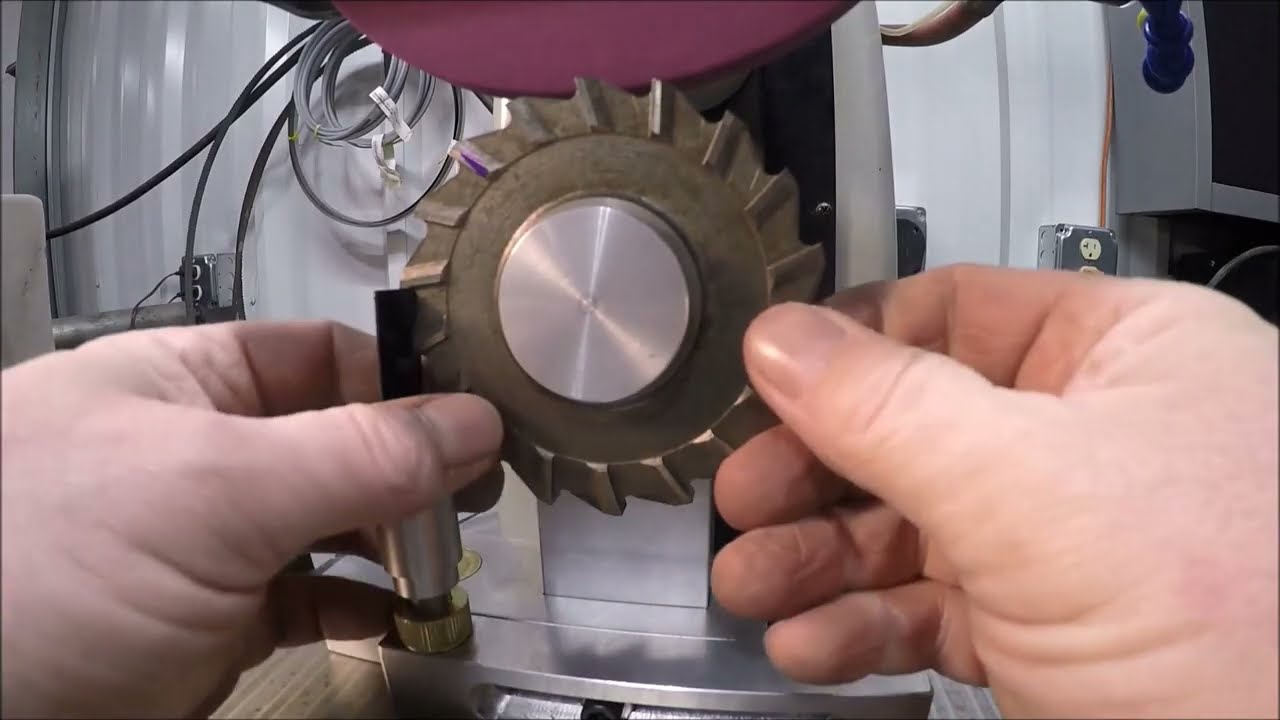 Horizontal milling cutter sharpening fixture follow up