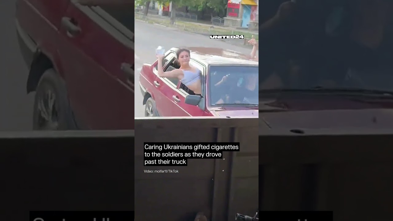 Ukrainian Gifted Cigarettes to the Soldiers As They Drove Past Their Truck #warinukraine