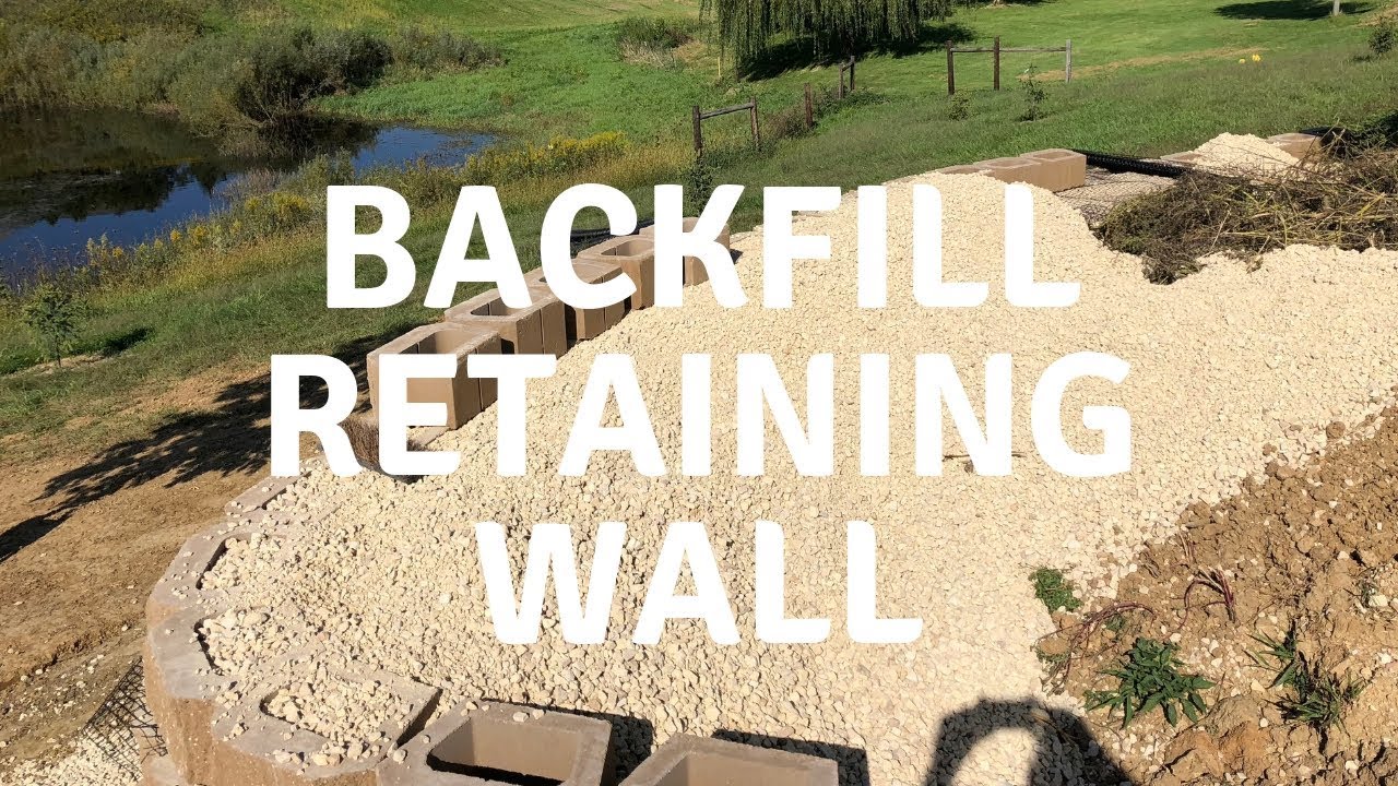 Backfill Retaining Wall with John Deere 2025r